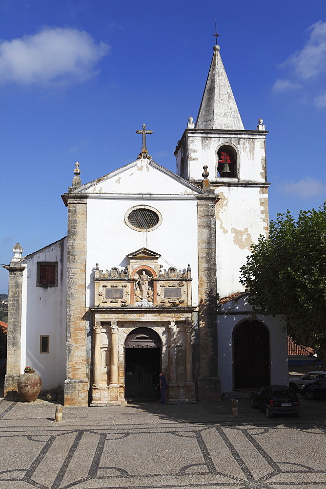 The medieval St. Mary Church (Igreja de Santa Maria) in centre of the walled city of Obidos, Estremadura, Portugal, Europe