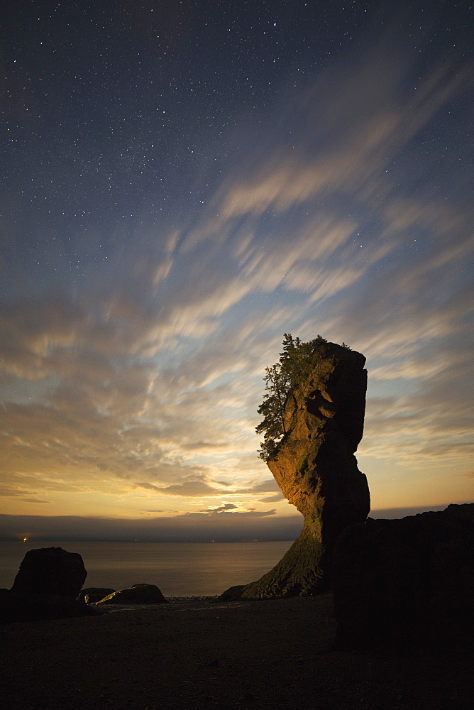 Hopewell Rocks, the flowerpot rocks, on the Bay of Fundy, scene of the world's highest tides, at night in New Brunswick, Canada, North America