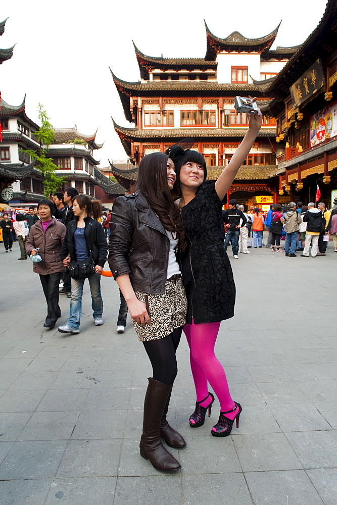 Tourists taking their own photograph at Yu Yuan Garden, Huangpu District, Shanghai, China, Asia