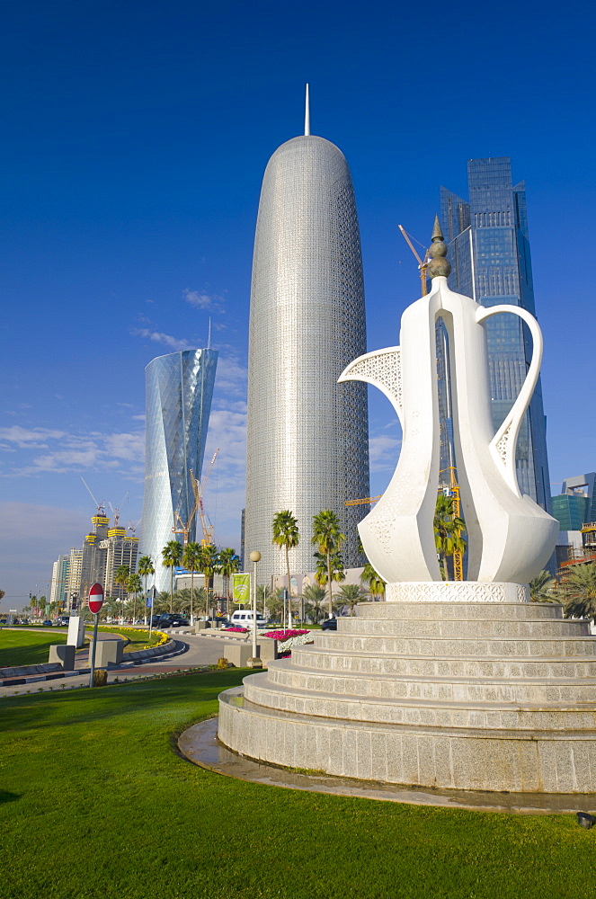 Corniche, Coffee Pot sculpture with Al Bidda Tower, Burj Qatar and Palm Tower behind, Doha, Qatar, Middle East