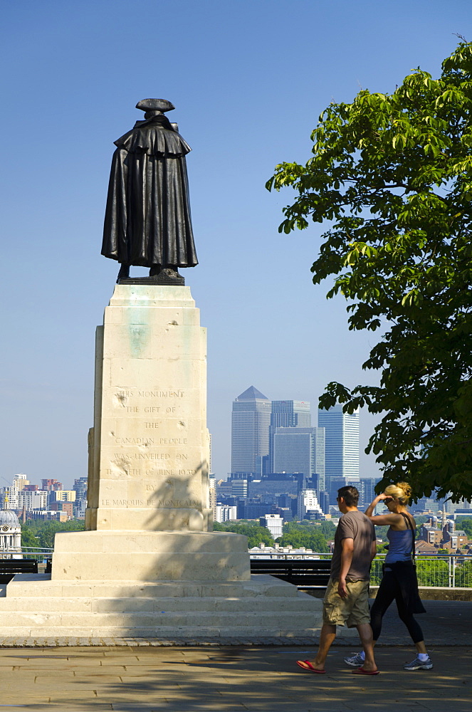 Statue of James Wolfe, Greenwich Park, with Canary Wharf in the background, London, England, United Kingdom, Europe