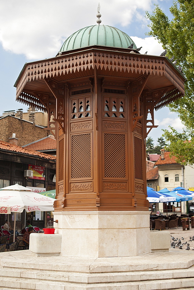 The Sebilj, a wooden and stone fountain in Bascarsija square in Sarajevo, Bosnia and Herzegovina, Europe