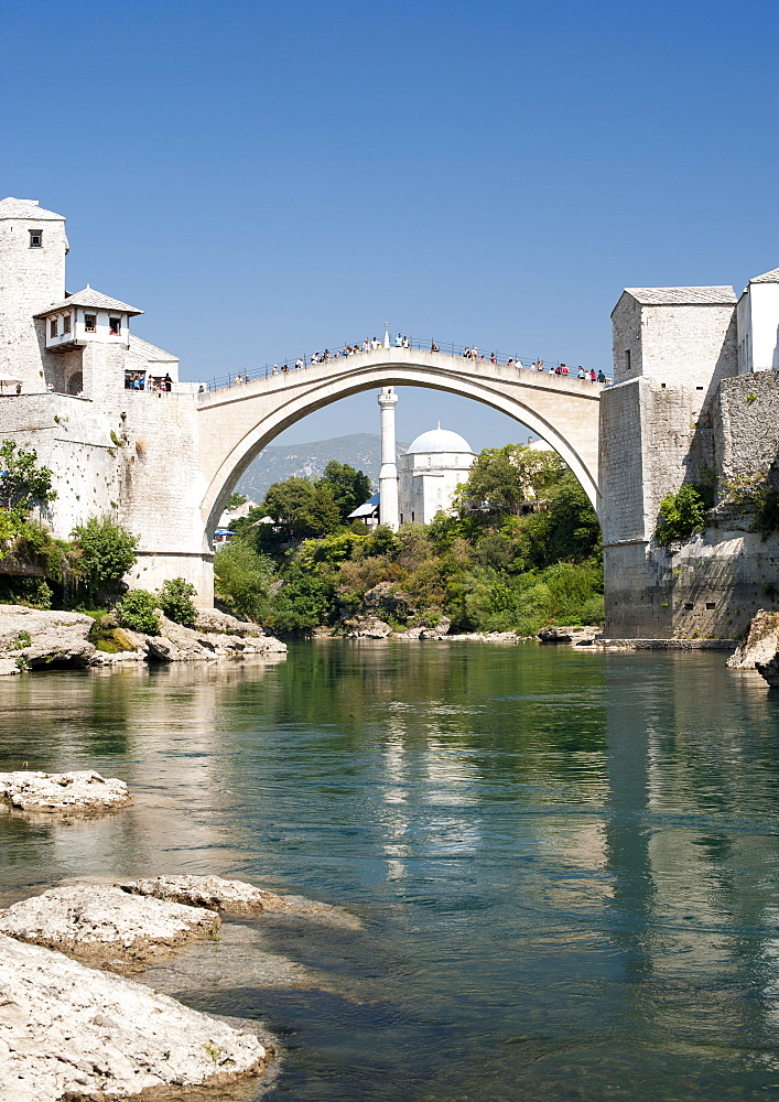 The Stari Most (Old Bridge) spanning the Neretva River in the Old City, UNESCO World Heritage Site, Mostar, Bosnia and Herzegovina, Europe