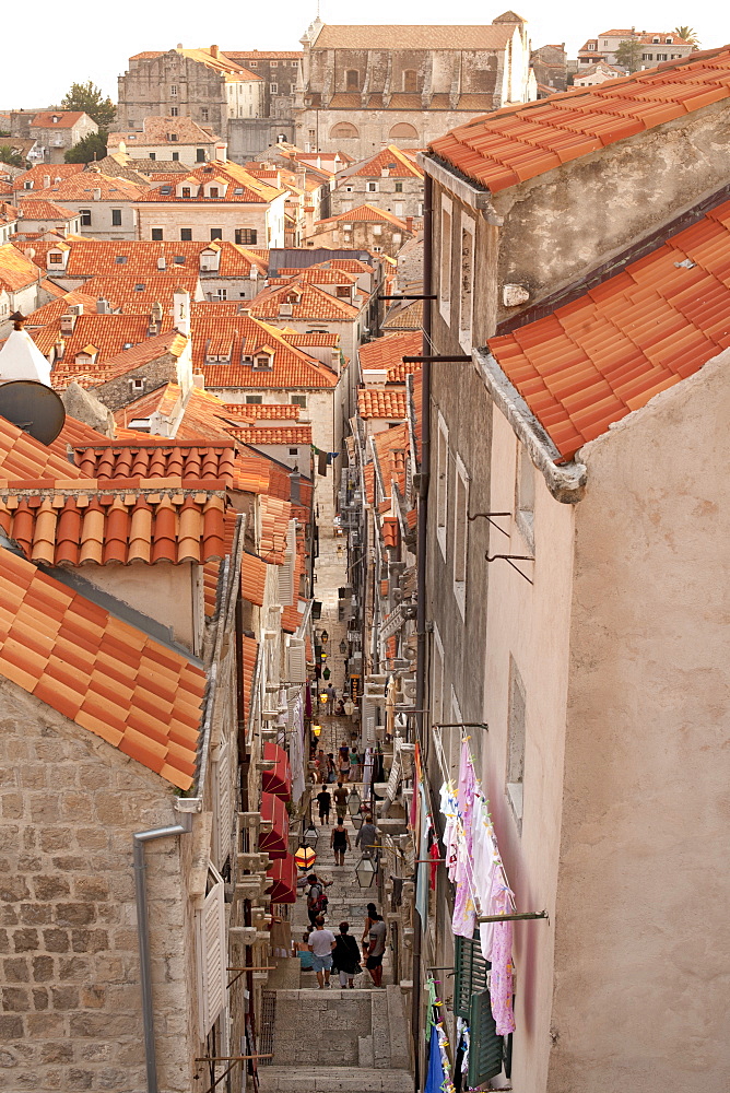 View over the rooftops of the old town in the city of Dubrovnik, UNESCO World Heritage Site, with Lokrum Island beyond, Adriatic Coast, Croatia, Europe