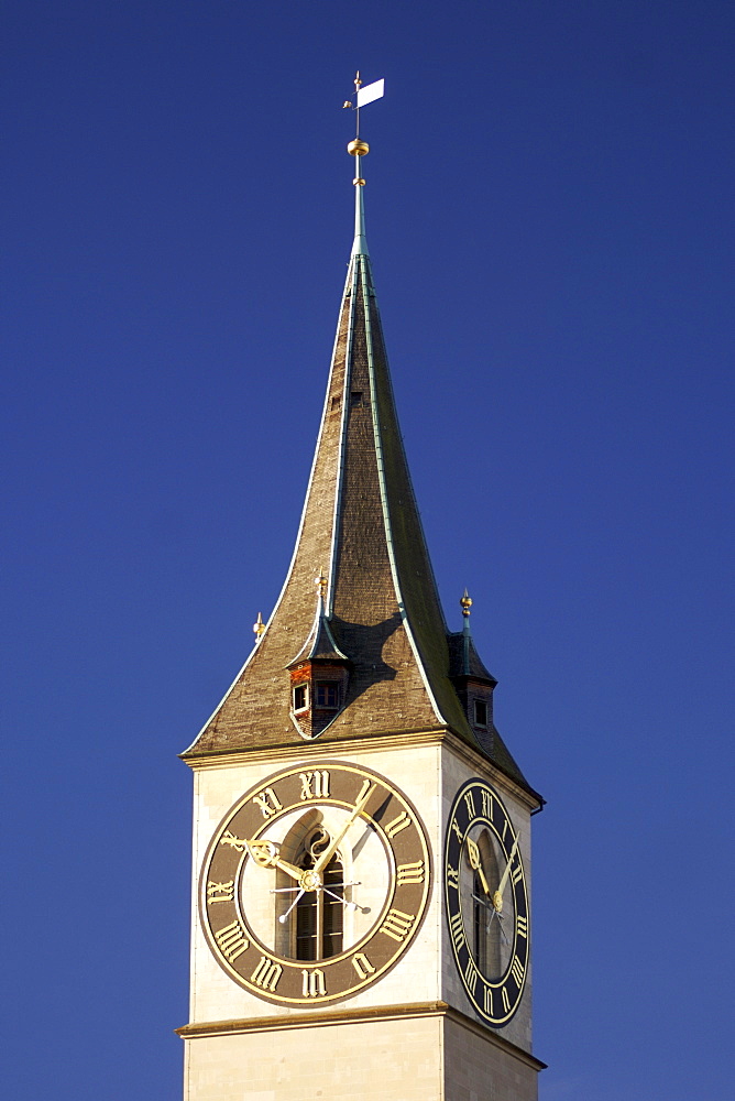 The steeple of St Peter's church in Zürich Switzerland. It has the largest clock face in Europe (8.7m).