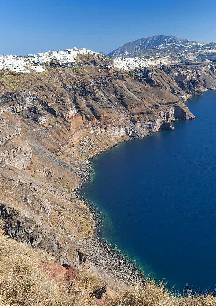 View of the coastline and houses of Fira and Firstefani on the Greek island of Santorini, Cyclades, Greek Islands, Greece, Europe