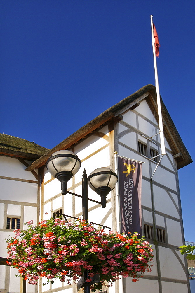 Shakespeare's Globe theatre on the south bank of the Thames river in London.