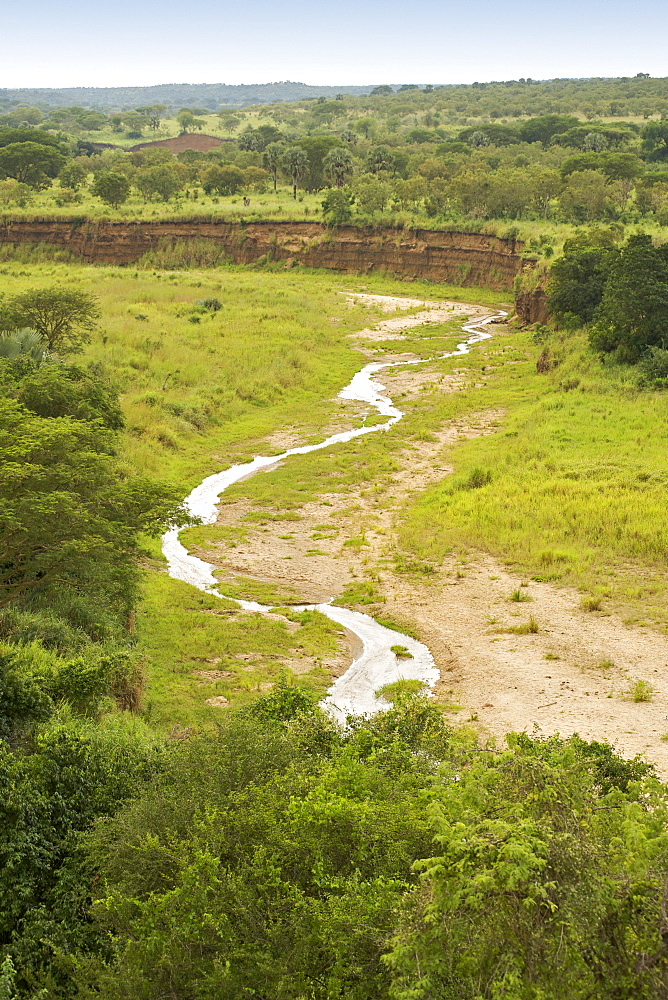 View across the plains and Nyamsika River from the Nyamsika Cliffs in Murchison Falls National Park in Uganda.