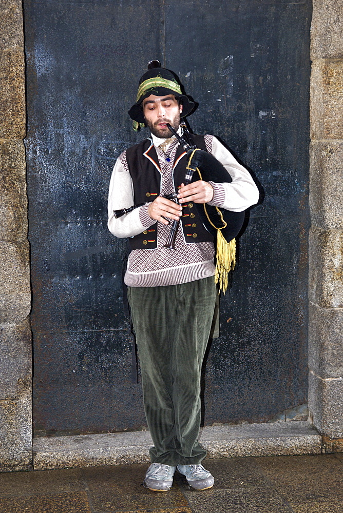 Spaniard playing the Gaitas, traditional Galician bagpipes in the A Corun~a province of Spain's Galicia region.