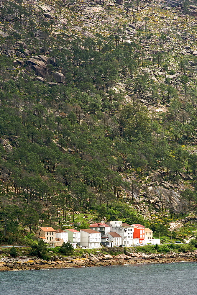 Houses of the village of E´zaro in the cove of E´zaro along the Atlantic coast of the A Corun~a province in Spain's Galicia region.