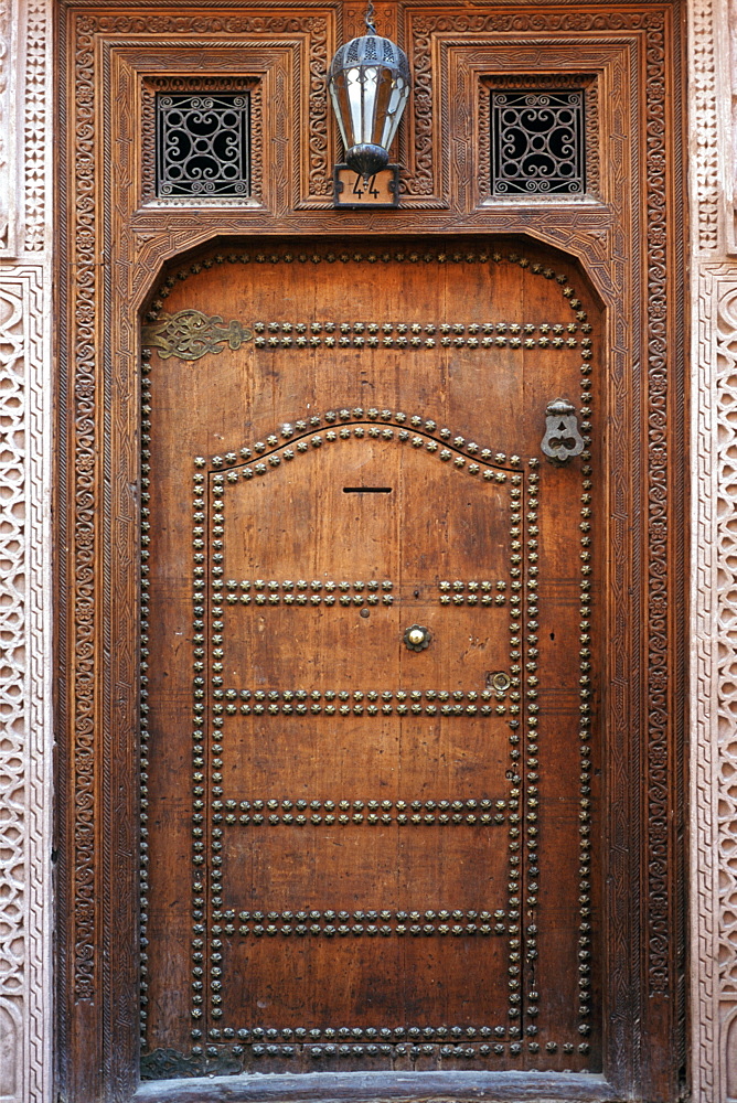 Wooden door in the medina in Marrakech, Morocco