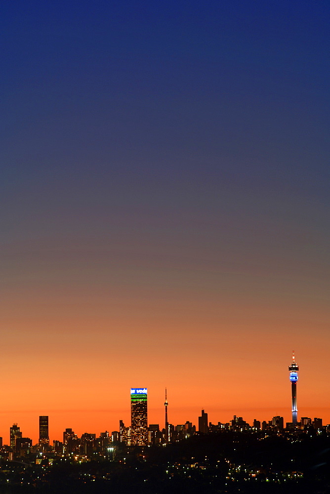 The Johannesburg skyline at dusk.