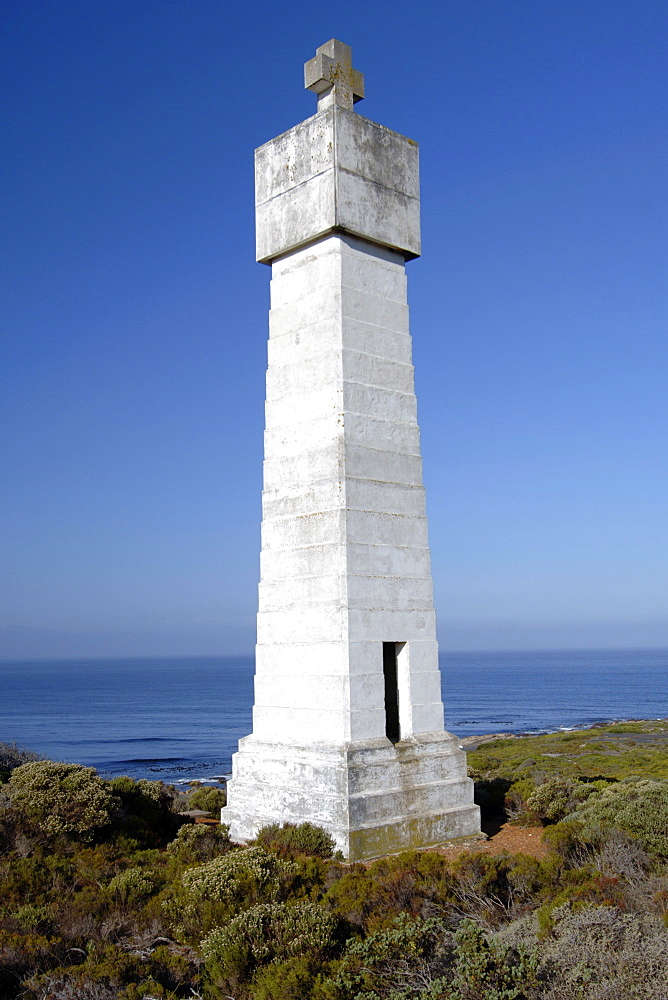 The Da Gama padrao, a monument to Vasco Da Gama in the Cape Point Nature Reserve in South Africa. Da Gama was a Portuguese sailor/explorer and led expeditions from the Cape to the East in 1497. A padrao is a limestone pillar bearing the Portuguese coat of arms and an inscription stating when and by whom it was raised. The cross signified Portuguese sovereignty and Christianity.