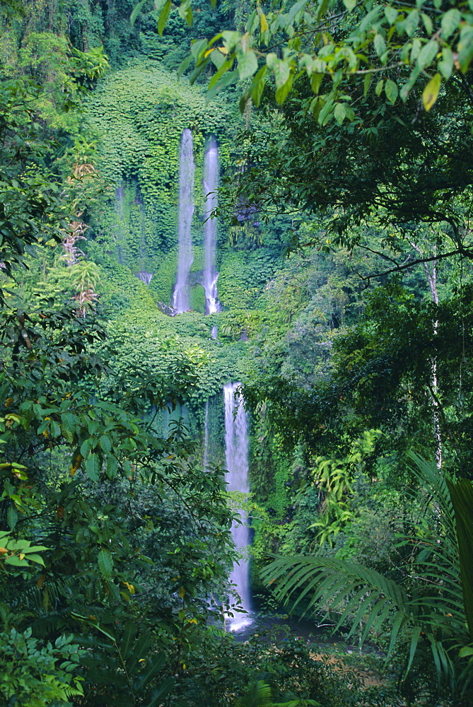 Waterfall on the northern slopes of 3726m Mt Rinjani volcano, near Senaru, Lombok, Indonesia