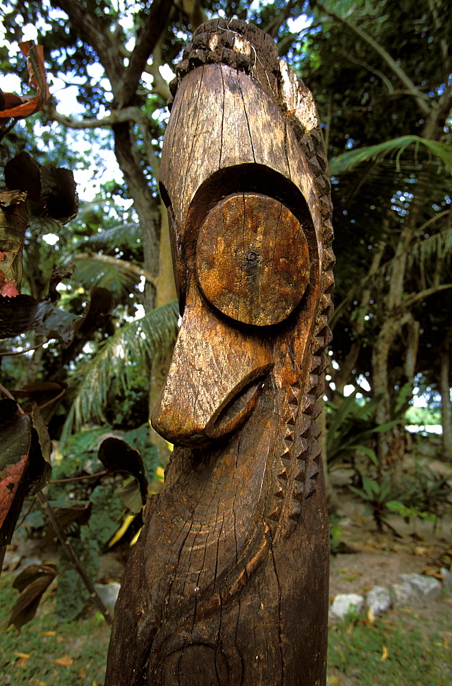 Wooden statue on the small resort island of  Erakor in Erakor Lagoon just south of the capital, Efate Island, Port Vila, Vanuatu