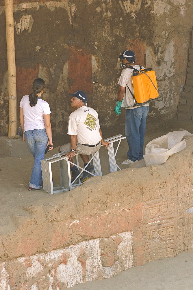 Preservation treatment of a mural by members of the National University of Trujillo team at this adobe brick temple pyramid of the Moche people (100BC-AD850) in the desert north, Huaca de la Luna, Trujillo, Peru, South America 