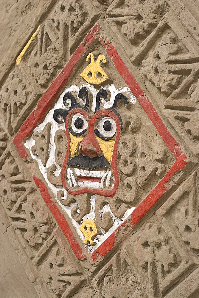 Rhomboid design with demon's face in the well-preserved murals at this adobe brick temple pyramid of the Moche people (100BC-AD850) in the desert north, Huaca de la Luna, Trujillo, Peru, South America