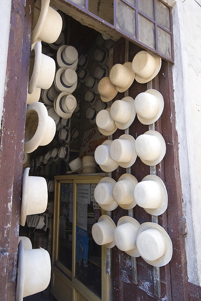 Shop of Alberto Pulla, the famous hatter on Calle Larga, where paja toquilla, misnamed panama hats, are sold and repaired with white sulphur paint, Cuenca, Azuay Province, Southern Highlands, Ecuador, South America