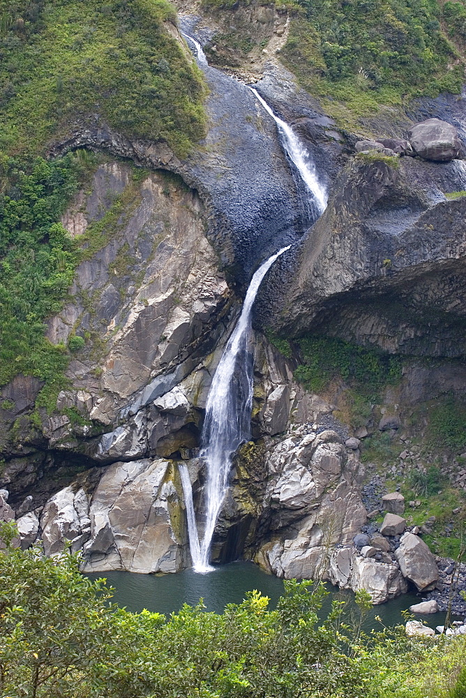 One of many picturesque waterfalls in the valley of the Rio Pastaza that flows from the Andes to the upper Amazon Basin, near Banos, Ambato Province, Central Highlands, Ecuador, South America