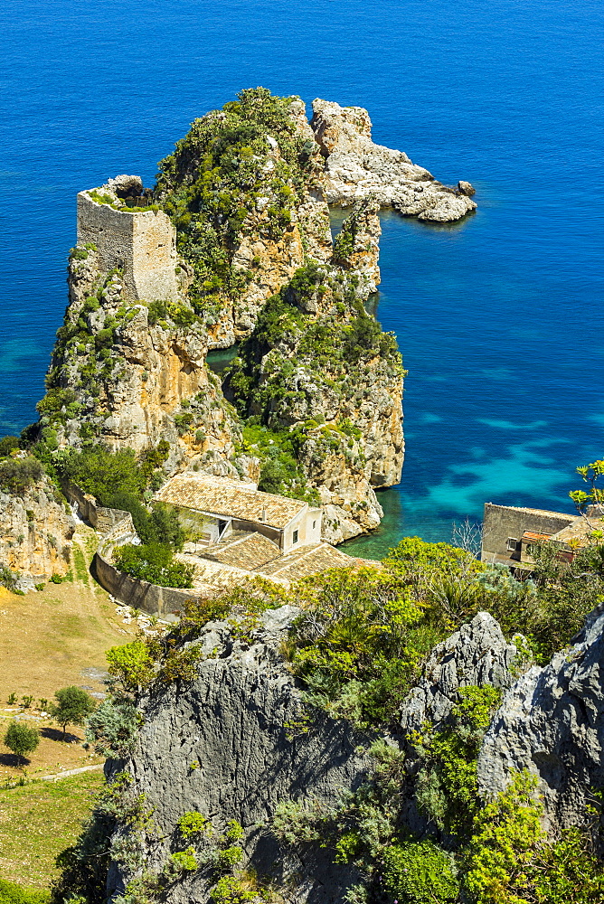 Old tower and buildings at the Tonnara di Scopello, an old tuna fishery and now a popular beauty spot, Scopello, Trapani, Sicily, Mediterranean, Europe