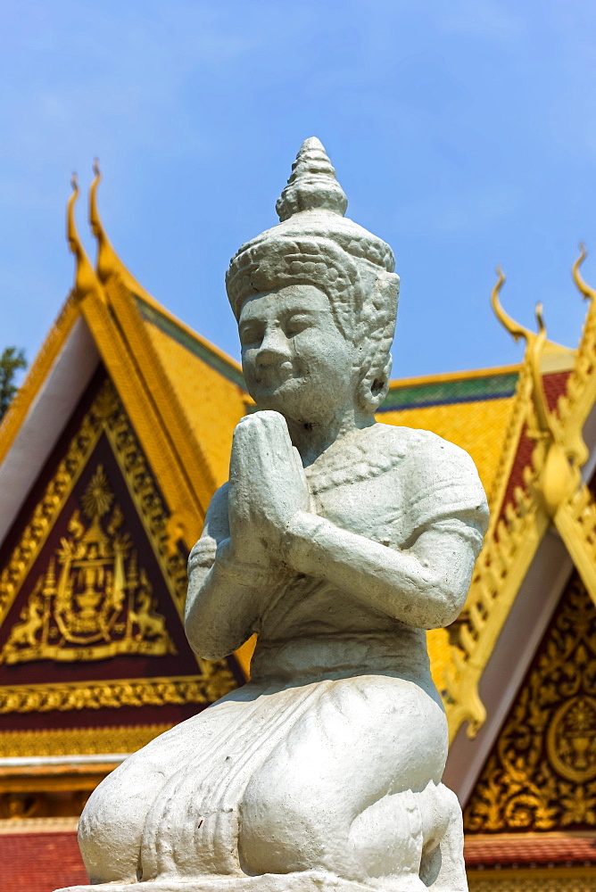 Kneeling Buddhist statue at the Mondapa of Satra and Triptika Library in the Royal Palace, City Centre, Phnom Penh, Cambodia, Indochina, Southeast Asia, Asia