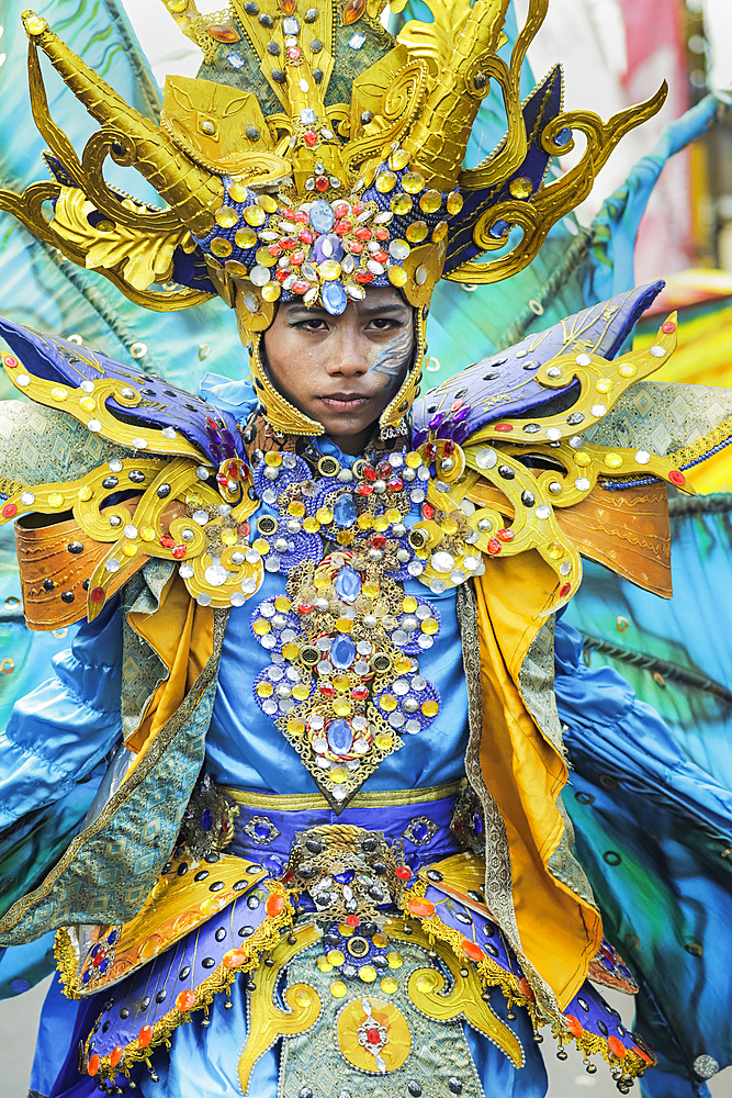 Young man in elaborate costume at the annual Tomohon International Flower Festival parade, Tomohon, North Sulawesi, Sulawesi, Indonesia, Southeast Asia, Asia