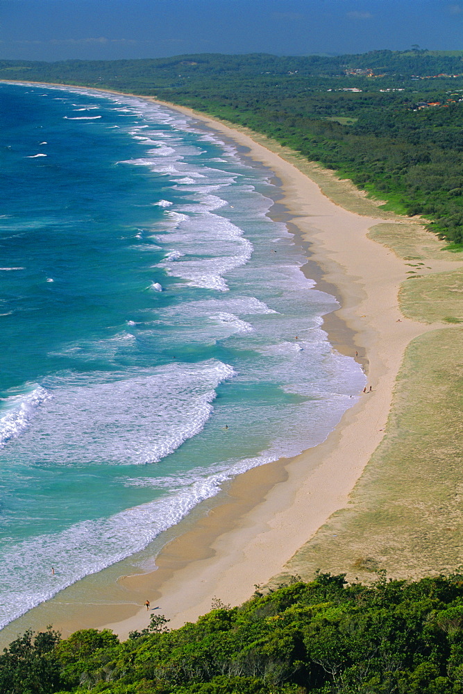 Tallow Beach from Cape Byron, a popular surfing spot east of the resort of Byron Bay in north east NSW, New South Wales, Australia