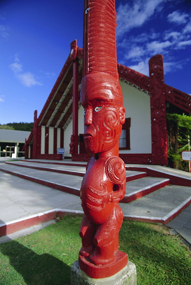 Carved wooden figure, or poupou, replica village, Maori Arts and Crafts Institute, Whakarewarewa thermal and cultural area, Rotorua, South Auckland, North Island, New Zealand, Pacific