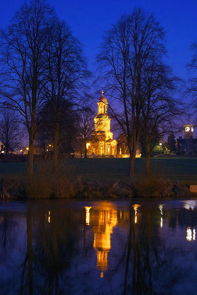 St. Chads church illuminated at night, reflections in River Severn, Quarry Park, Shrewsbury, Shropshire, England, United Kingdom, Europe