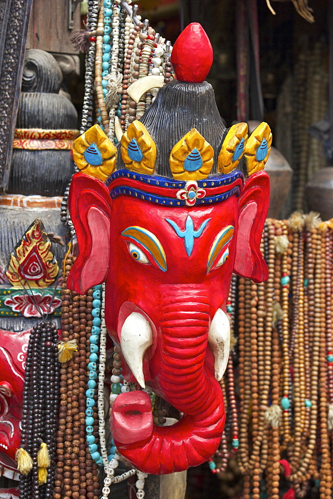 Mask of Ganesha, a Hindu god, on sale at Swayambhunath Stupa (Monkey Temple), Kathmandu, Nepal, Asia 