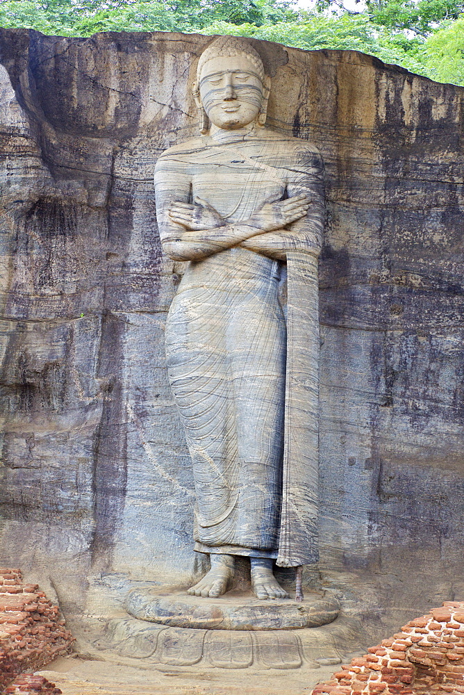 Buddha standing on lotus plinth in blessing posture, Gal Vihara Rock Temple, Polonnaruwa, Sri Lanka, Asia