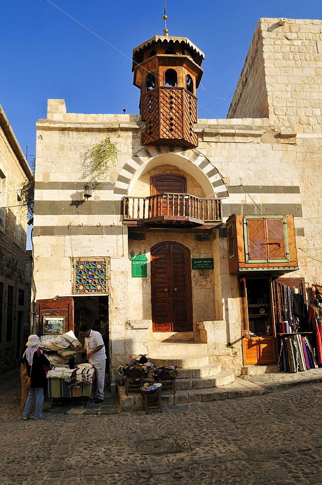 Small mosque and souvenir shop in the historic town of Hama, Syria, Middle East, West Asia