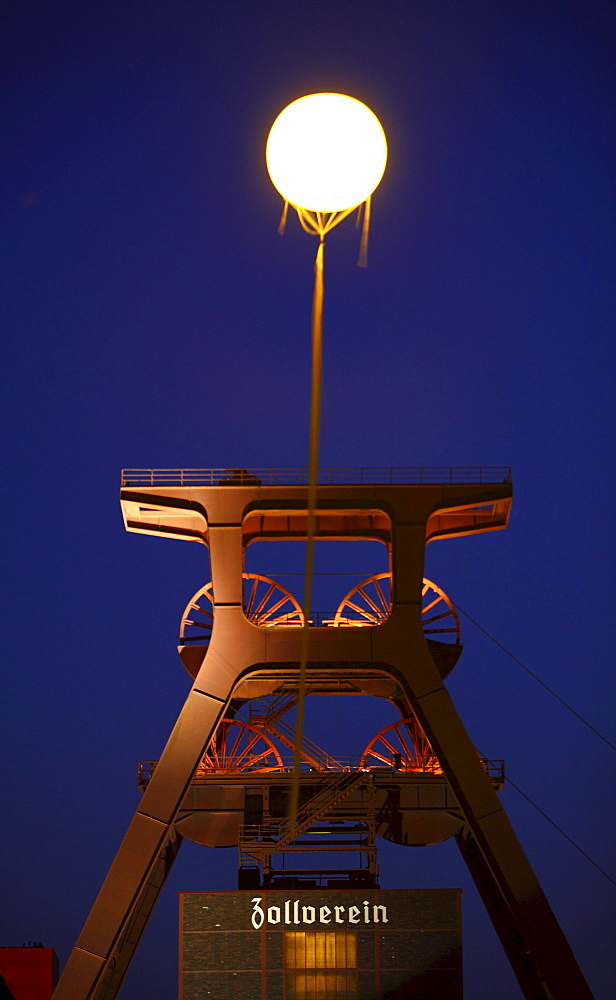 Glowing balloon on the grounds of the Zeche Zollverein mine, part of the Schachtzeichen art project of the Kulturhaupstadt-Jahr Ruhr2010 Capital of Culture-year, 311 yellow balloons mark former mine shafts, Oberhausen, Ruhrgebiet area, North Rhine-Westpha