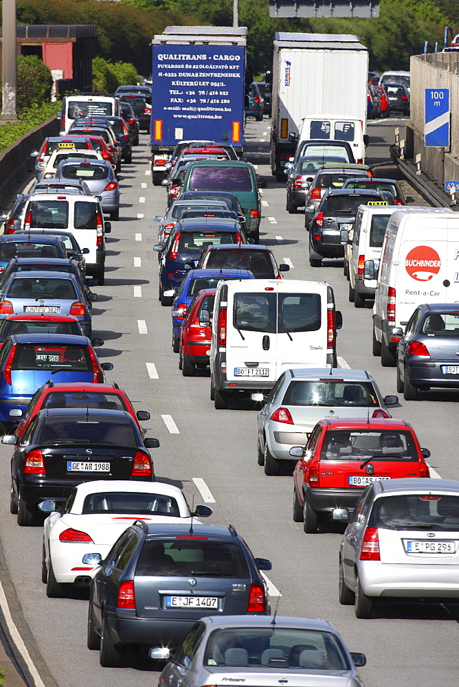 Long, dense traffic jam on the highway A40, so-called Ruhrschnellweg, in front of a long-term construction site between Essen and Gelsenkirchen, Ruhrgebiet region, North Rhine-Westphalia, Germany, Europe