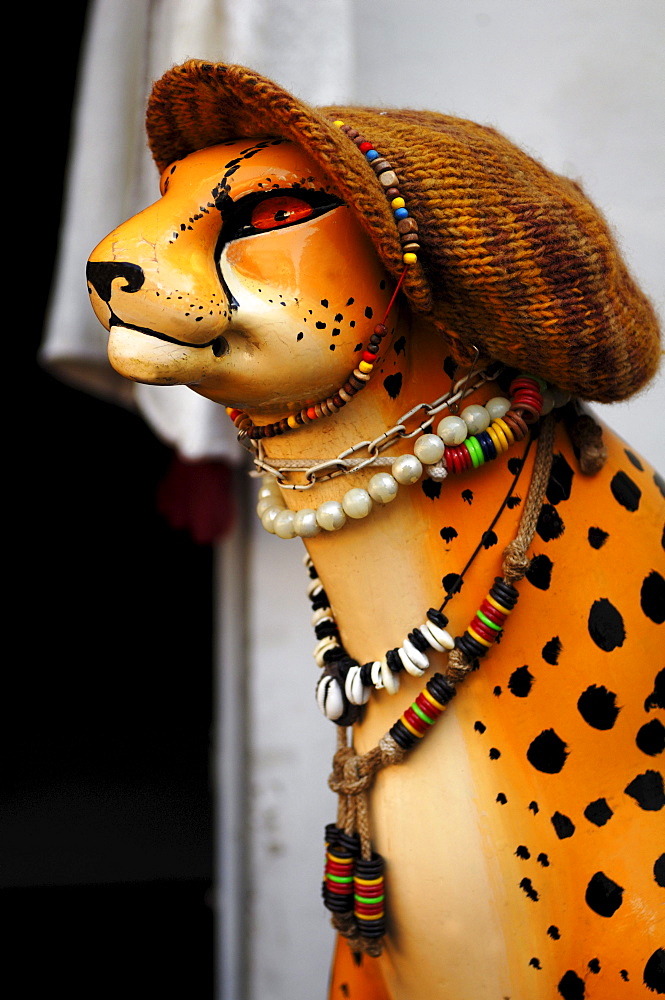 Decoration, figure of a Leopard with a knitted cap and jewelry in front of a fashion shop, Heidelberg, Baden-Wuerttemberg, Germany, Europe