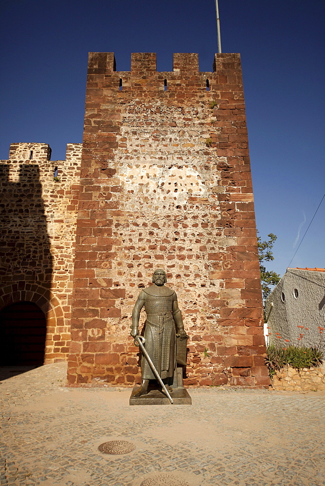 Bronze statue of King Sancho I at the entrance to the Castelo dos Mouros, Castle of the Moors, in Silves, Algarve, Portugal, Europe