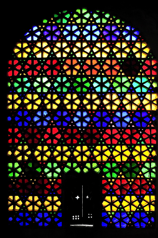 Colorful stained-glass window in the city palace of Udaipur Rajasthan, India, Asia