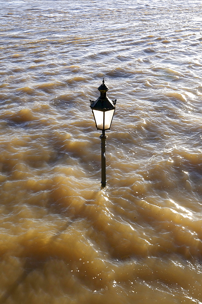 Street-lamp in high water on the Rheinpromenade at Rees, Lower Rhine, North Rhine-Westphalia, Germany, Europe