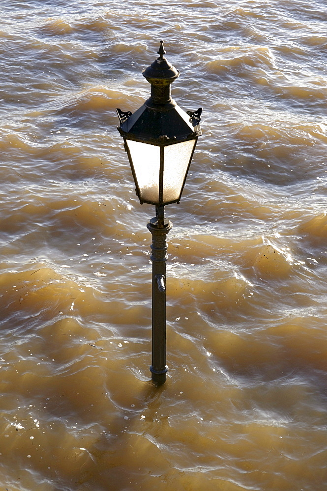 Street-lamp in high water on the Rheinpromenade at Rees, Lower Rhine, North Rhine-Westphalia, Germany, Europe