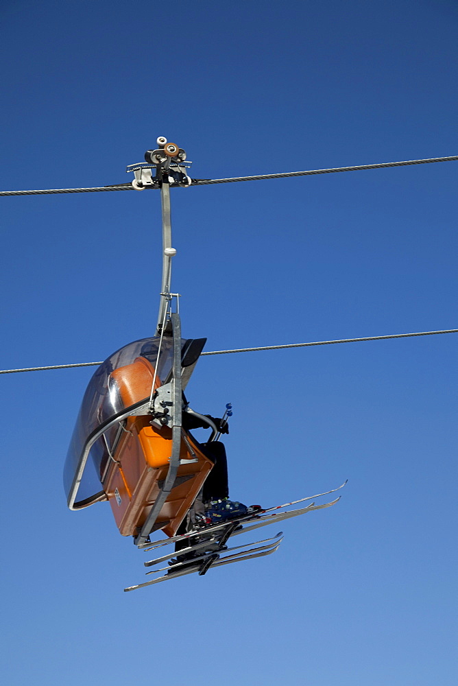 Skiers in a chair lift, St. Leonhard, Fanes-Sennes-Prags Nature Park, Val Badia, Alta Badia, Dolomites, South Tyrol, Italy, Europe