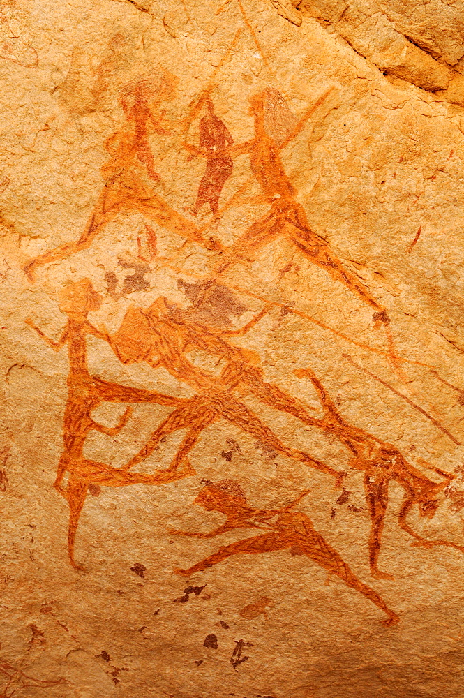 Hunting scene, neolithic rock art of the Tadrart, Tassili n'Ajjer National Park, Unesco World Heritage Site, Algeria, Sahara, North Africa