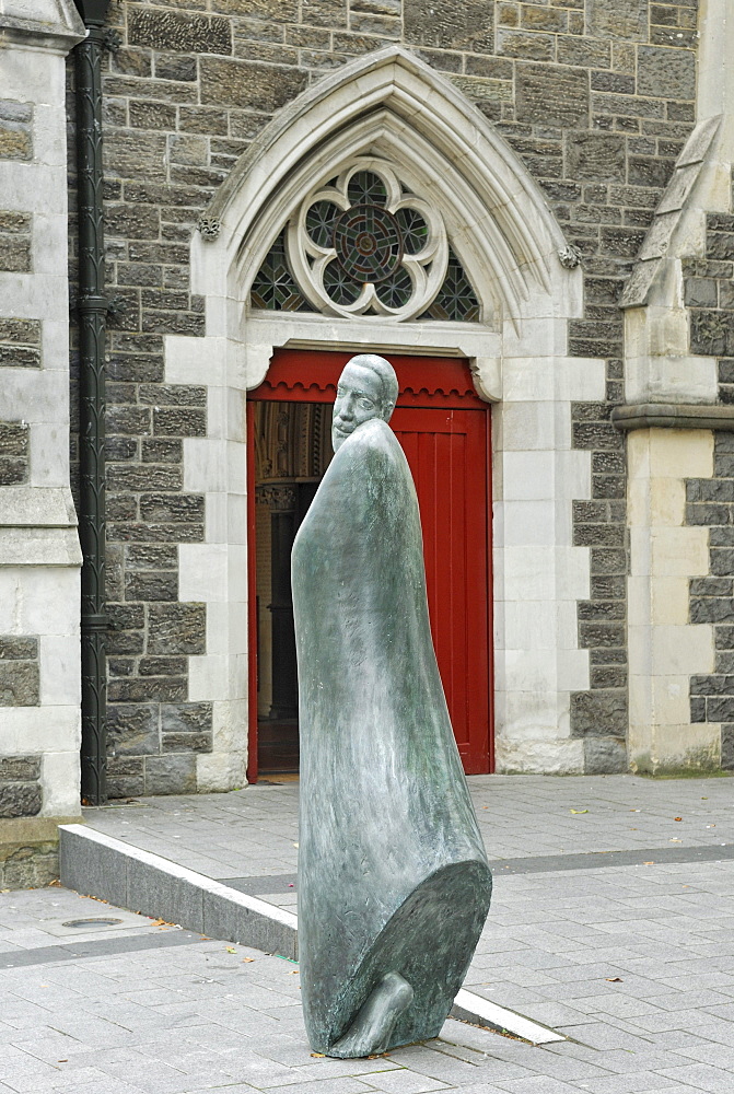 Bronze statue of a monk outside Christchurch Cathedral, Cathedral Square, Christchurch, South Island, New Zealand