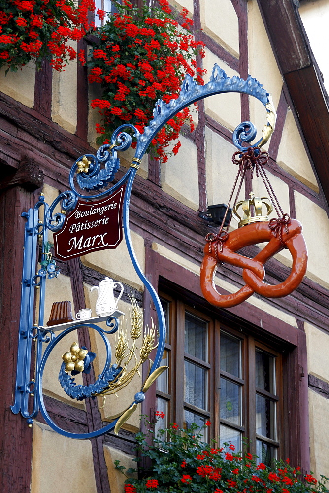 Bakery shop hanging-sign, Eguisheim, Alsace Wine Route, France, Europe