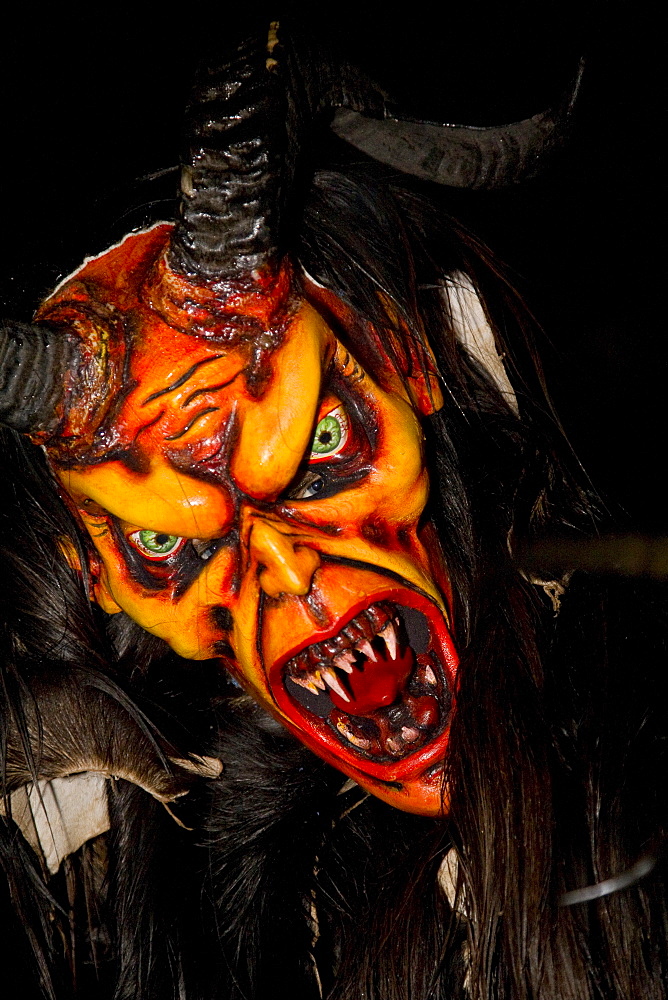 Krampus mask, devil costume in Ora, Alto Adige, Italy, Europe