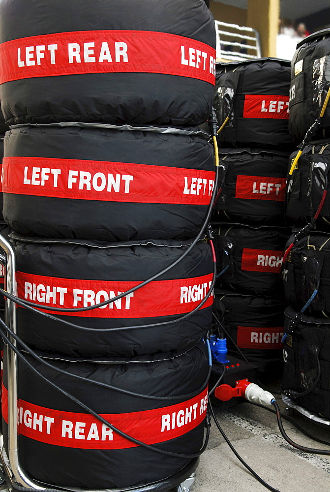 Stacks of Pirelli Formula 1 racing tyres packed in tyre warmers in the paddock at the Circuit Ricardo Tormo near Valencia, Spain, Europe