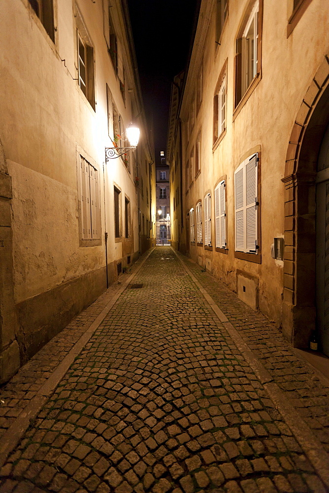 Alley at night in the district of La Petite France, Strasbourg, Ill, Alsace, France, Europe