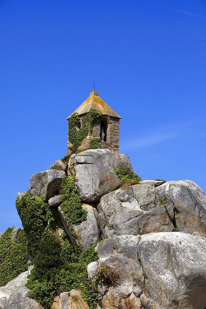 Tower at Port Blanc on the Cote de Granit Rose, pink granite coast, Cotes d'Armor, Brittany, France, Europe