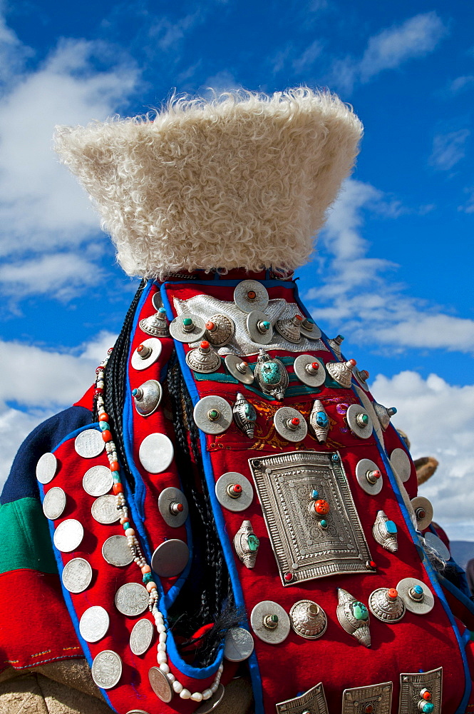 Traditionally dressed woman, traditional festival of the tribes in Gerze, Western Tibet, Asia