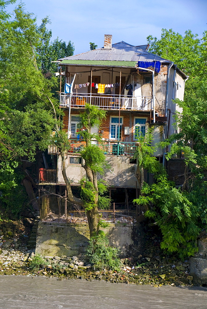 Old house by the water, Kutaisi, Georgia, Caucasus, Middle East