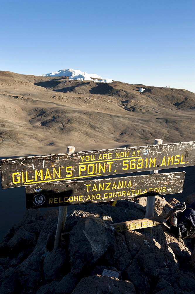 Trekking, mountain climbing, sign at the summit of Gilman's Point, stepped glacier on the crater rim, Kilimanjaro, Marangu Route, Tanzania, East Africa, Africa